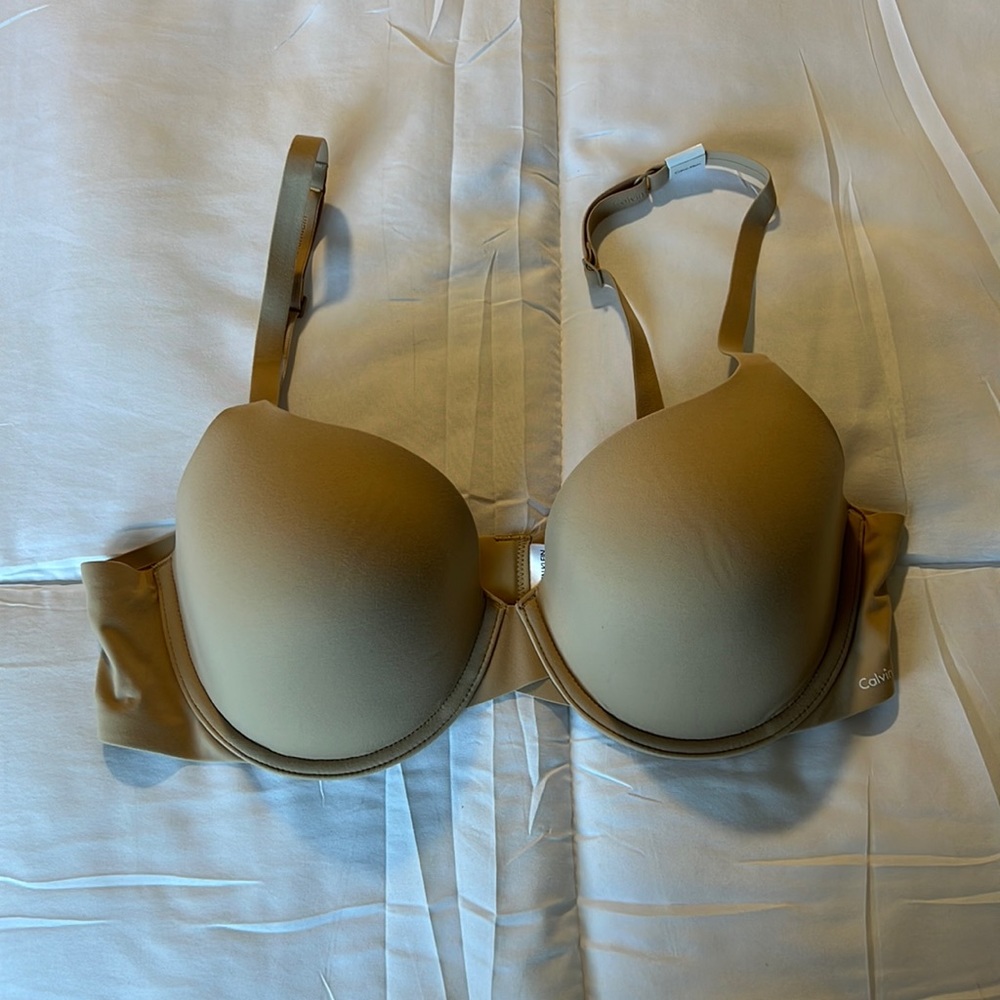 CAVLVIN KLEIN nude bra 36C, new with tags